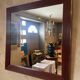 Miroir en bois et laiton, 80 cm