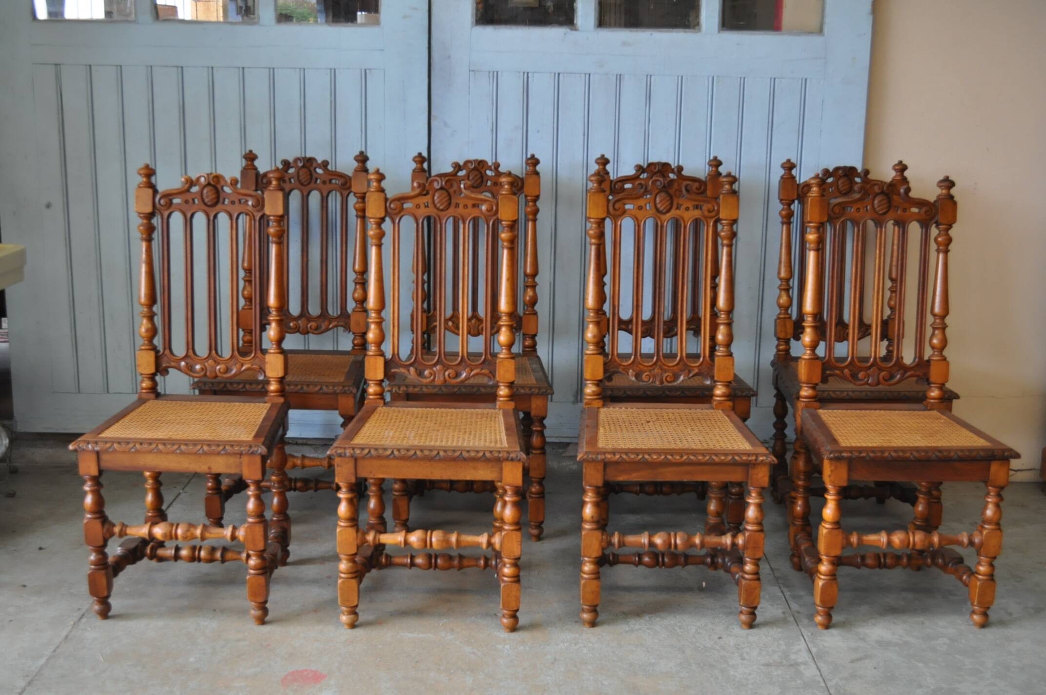 Set of 8 tanned chairs.