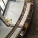 Vintage mirror in solid wood with brass and parcloses.