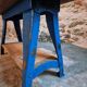 Vintage industrial workbench table with cast iron legs (Aux Forges de Vulcain)