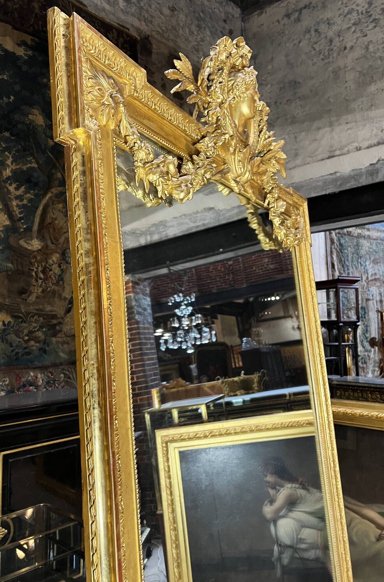 Monumental mirror Napoleon III in gilded wood with the profile of Apollo