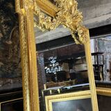 Monumental mirror Napoleon III in gilded wood with the profile of Apollo