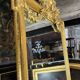 Monumental mirror Napoleon III in gilded wood with the profile of Apollo