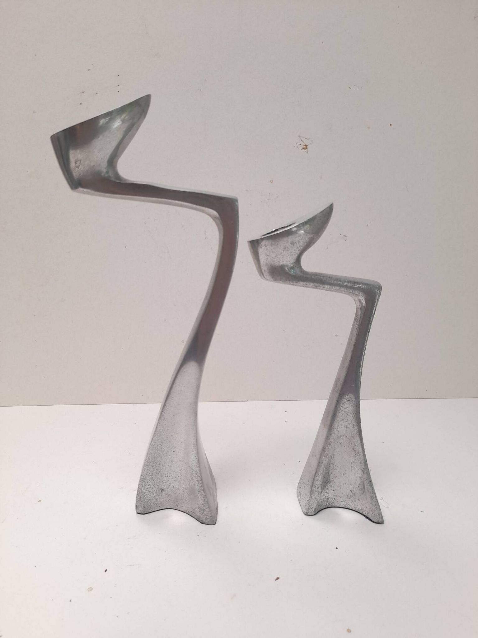 Pair of Swan candlesticks by Matthew Hilton