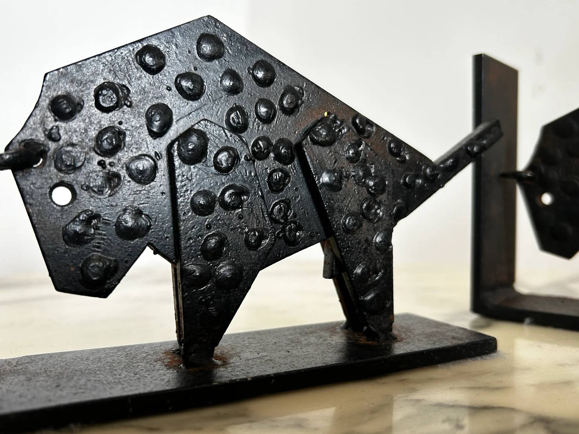 Pair of brutalist buffalo / bison bookends, black metal, mid-century