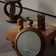 Round wooden wall decorative mirror, carved frame, mid-20th century, 1950s.
