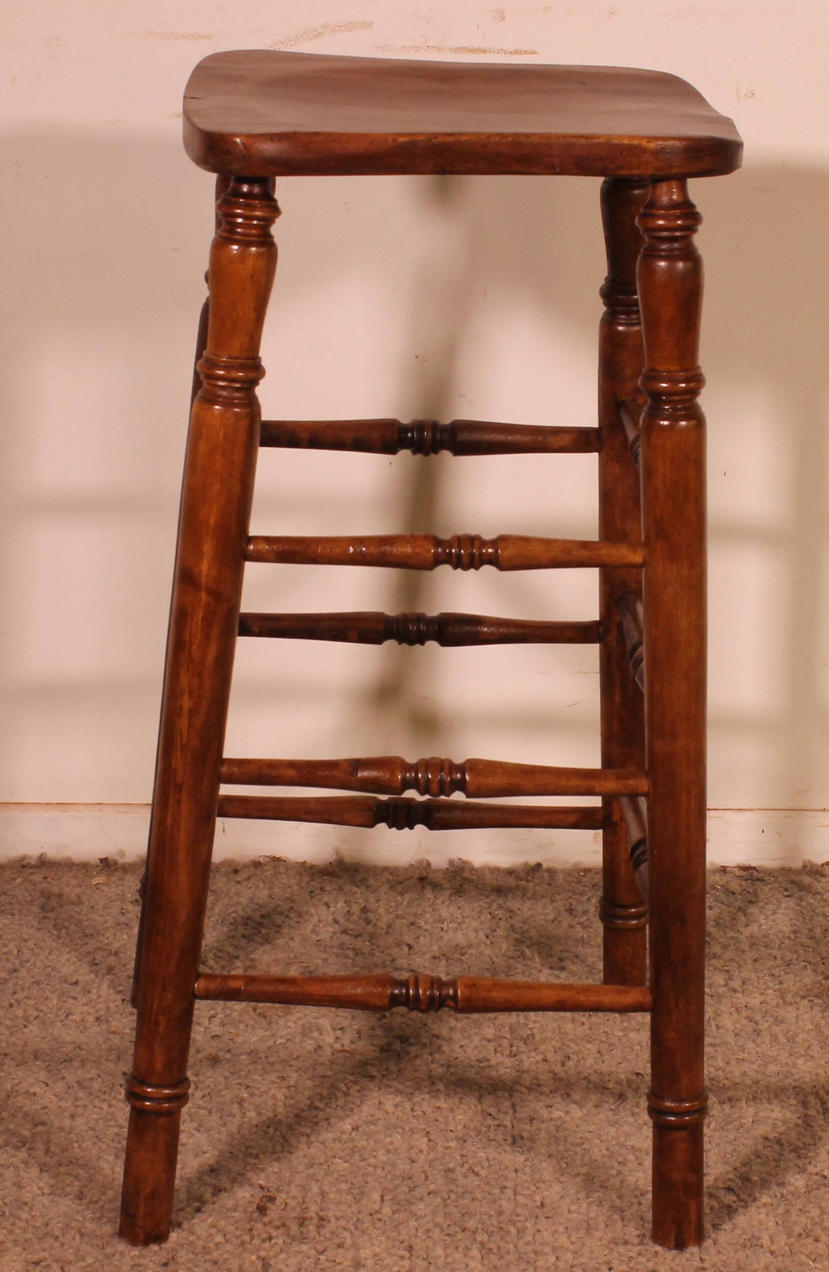 19th-century elm bar stool