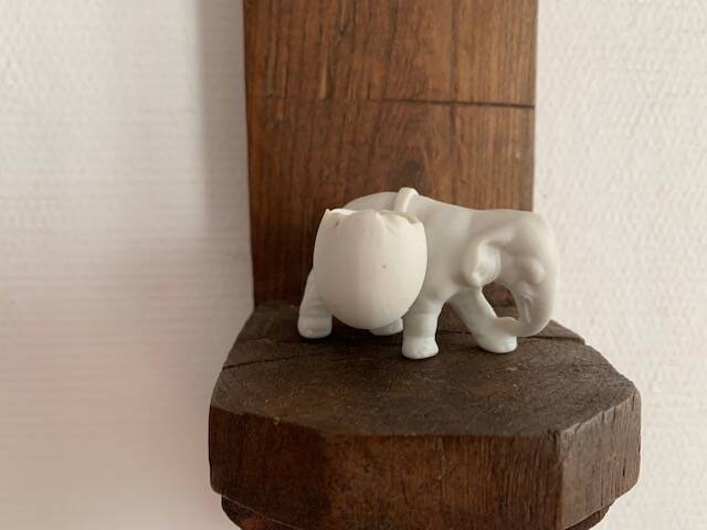 Small elephant in biscuit porcelain, 19th century salt cellars