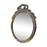 Miroir ovale doré style Louis XVI
