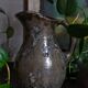Potter's pitcher Art-popular in old enamelled earth