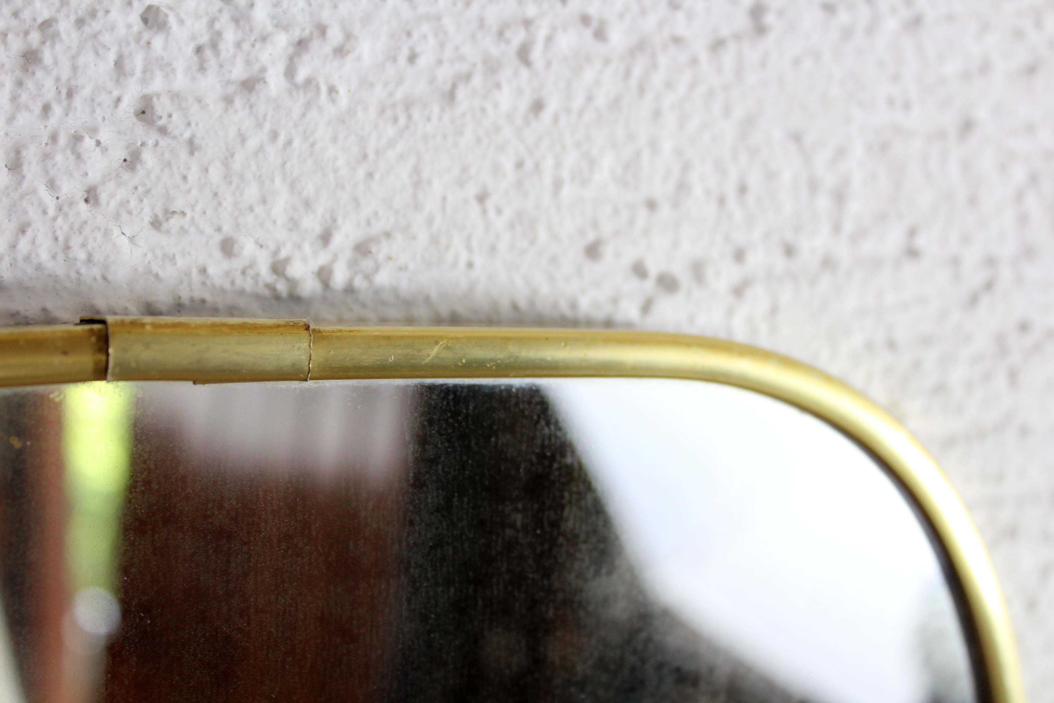 Asymmetrical mirror brass 60x31cm