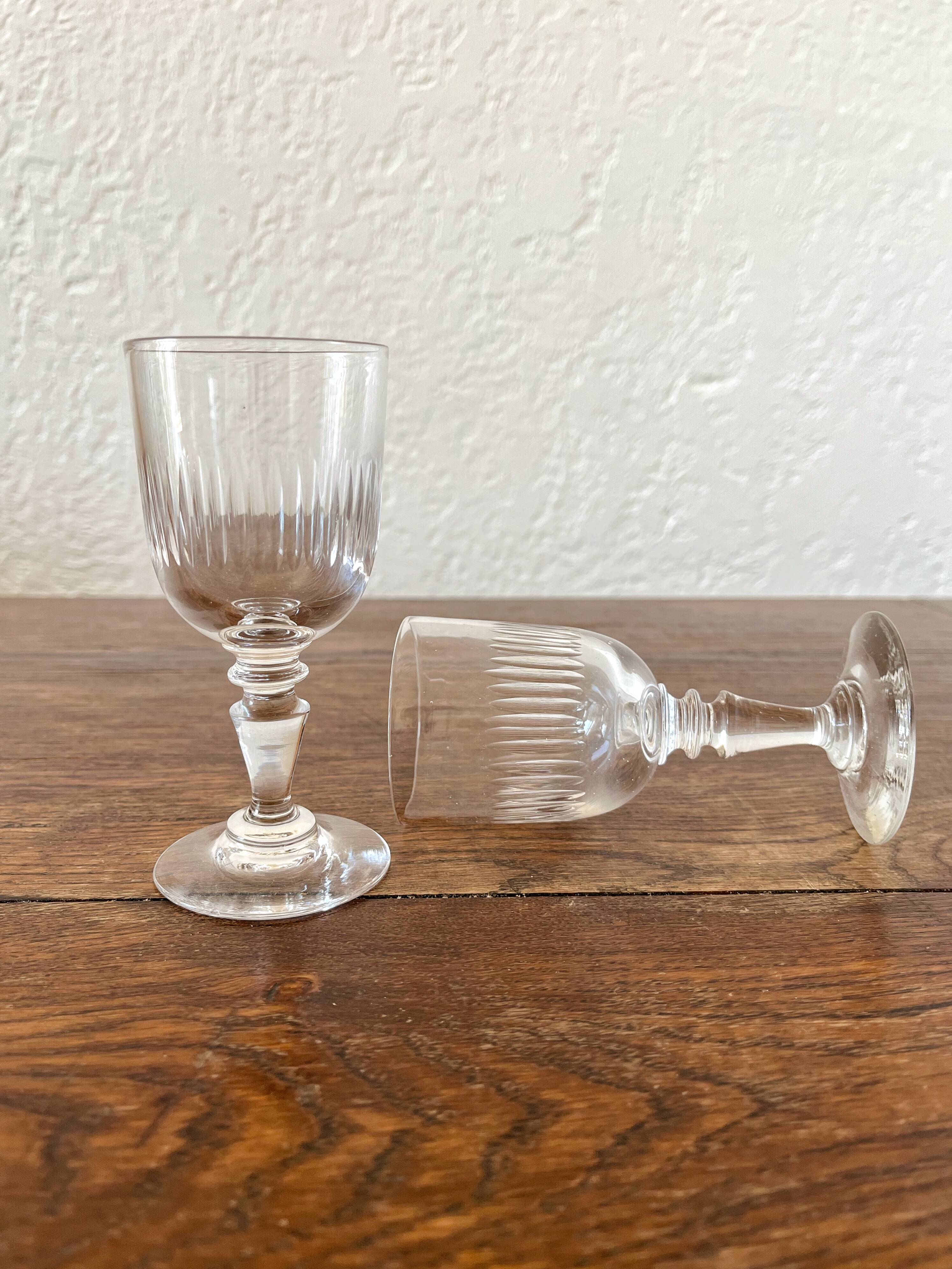 2 white wine stemmed glasses in ribbed glass from the 19th century