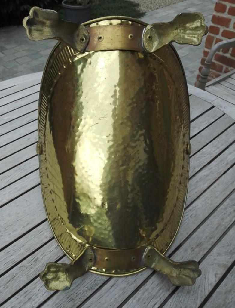 Old brass log holder