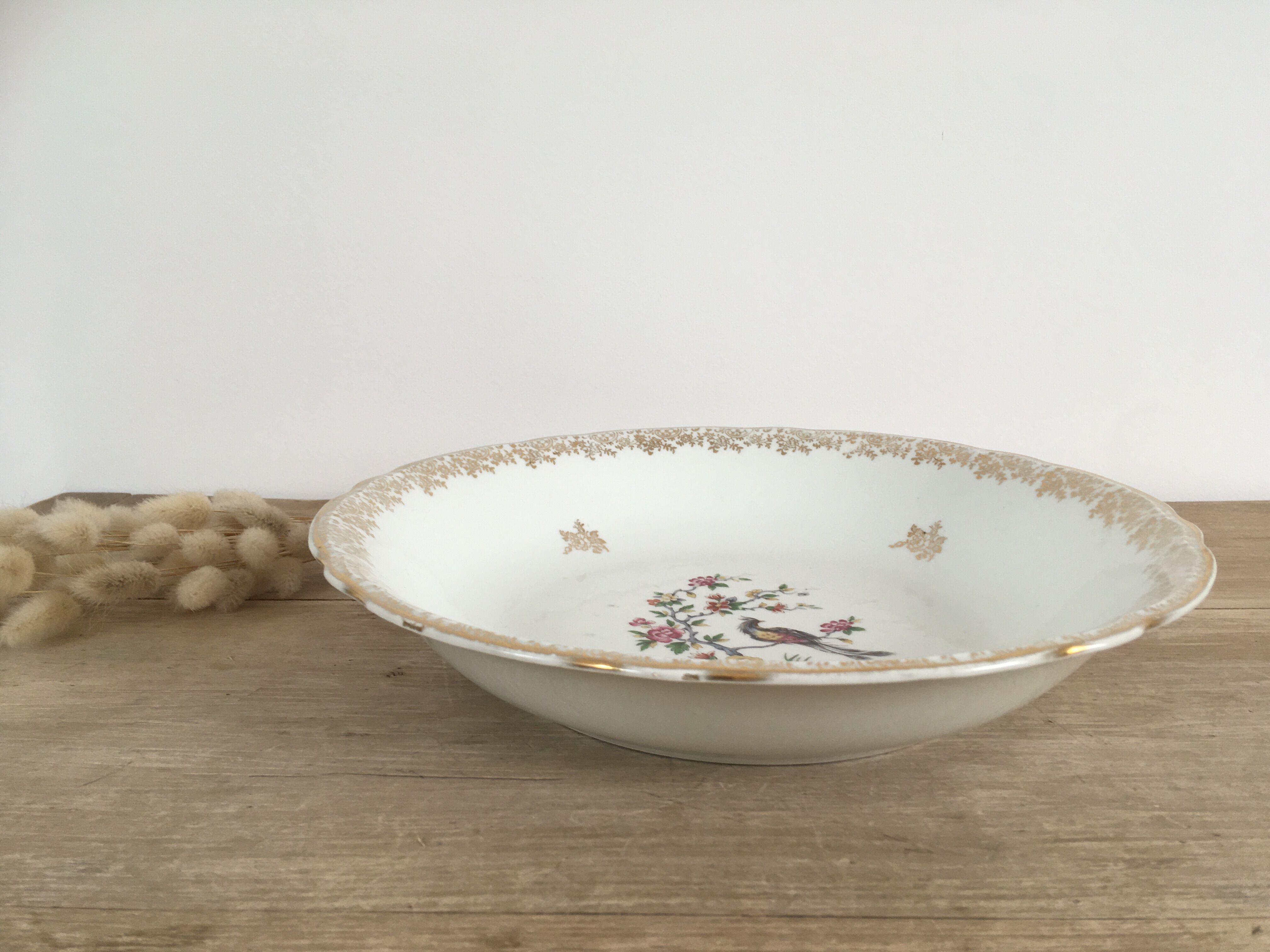 Hollow dish porcelain bird of paradise
