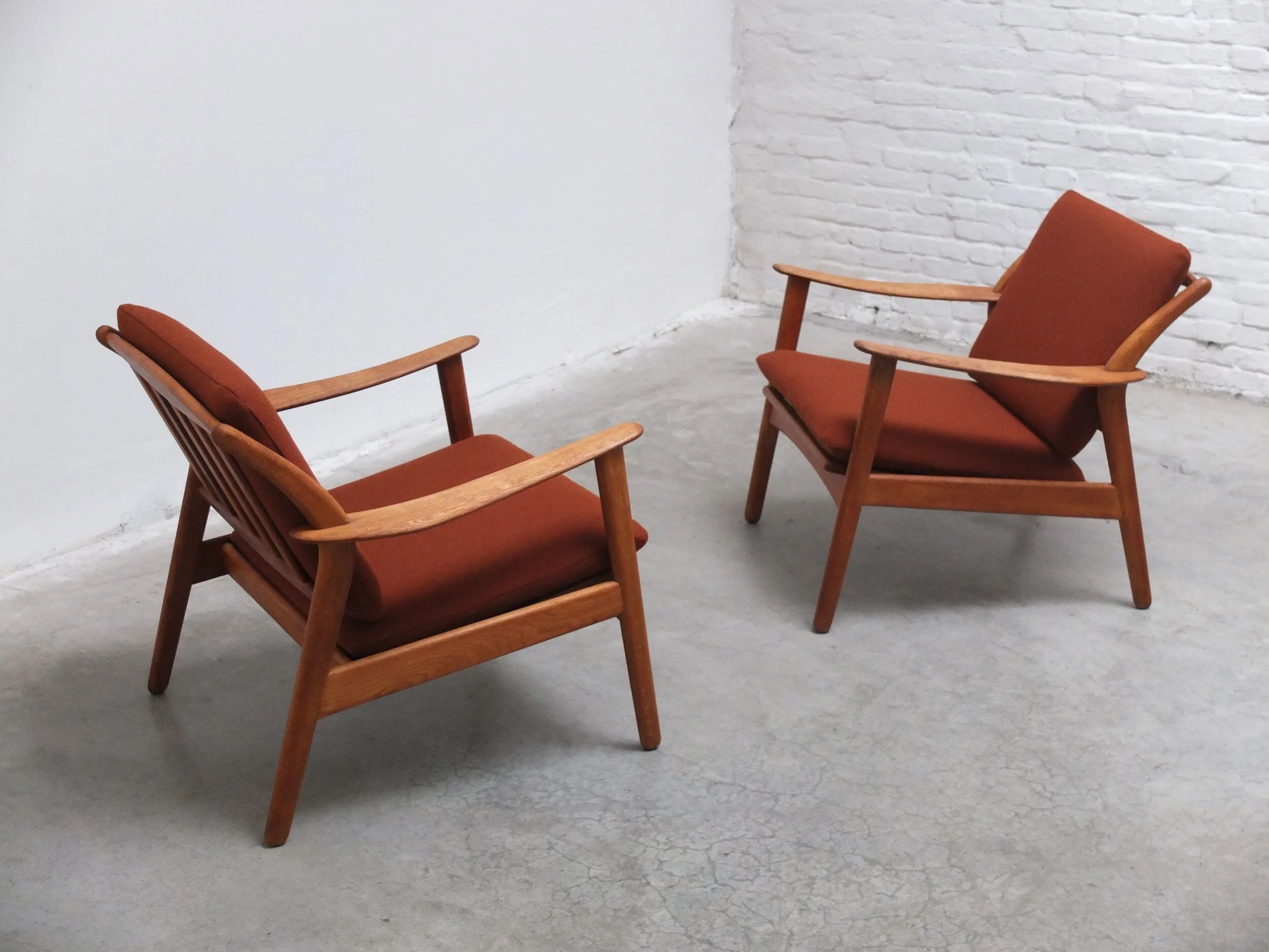 Danish pair of easy chairs in oak by Niels Koefoed, 1960s