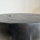 Black mango wood tripod side table with a semi-spherical top, height: 45 cm, diameter: 44 cm.