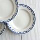 4 antique ceramic plates with blue flowers