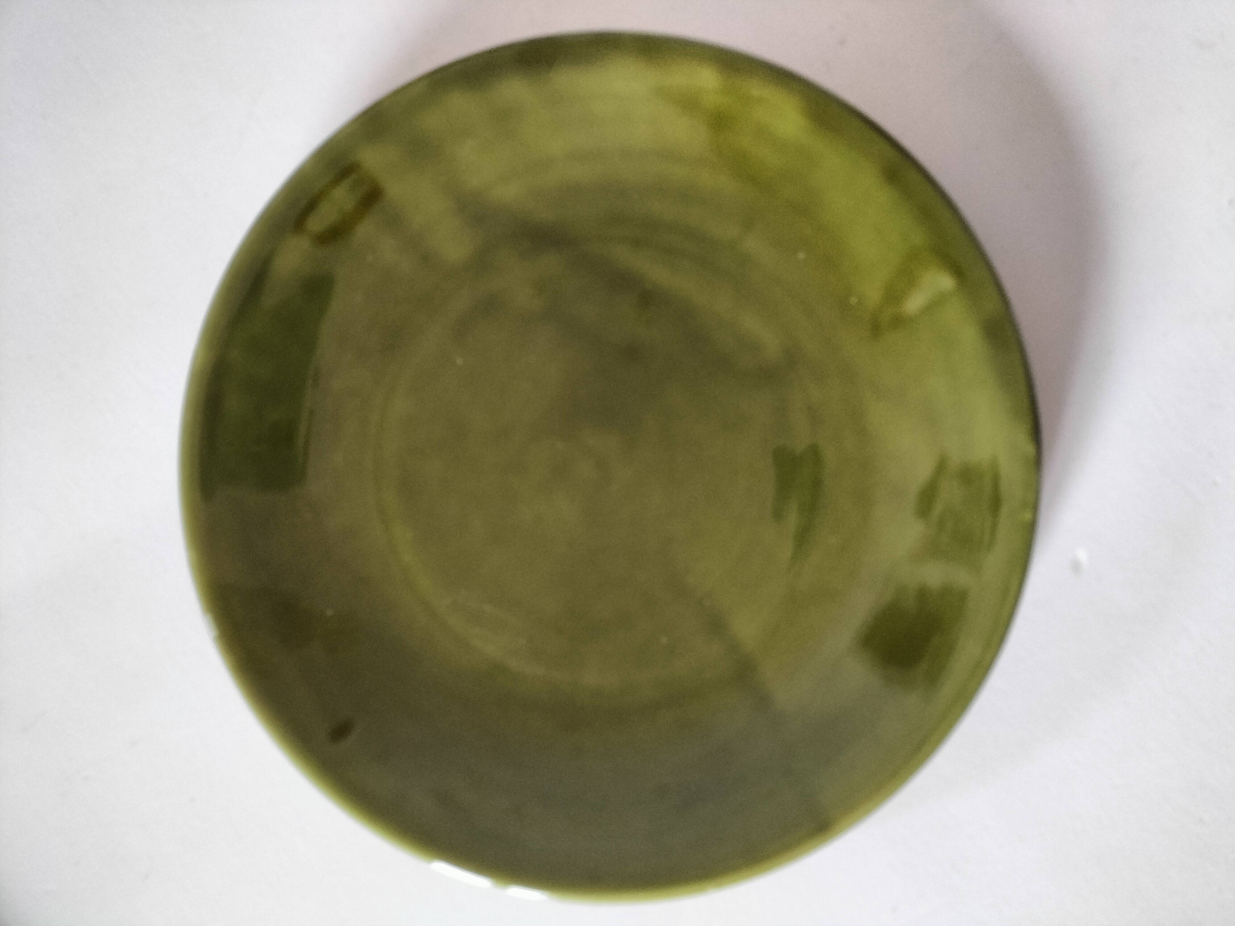 Set of green and amber enamelled plates