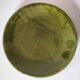 Set of green and amber enamelled plates