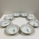 Vintage porcelain service: salad bowl and 8 small bowls.