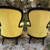 Pair of 19th century armchairs in black lacquered wood