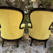 Pair of 19th century armchairs in black lacquered wood