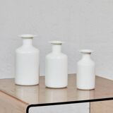 3 white vases
