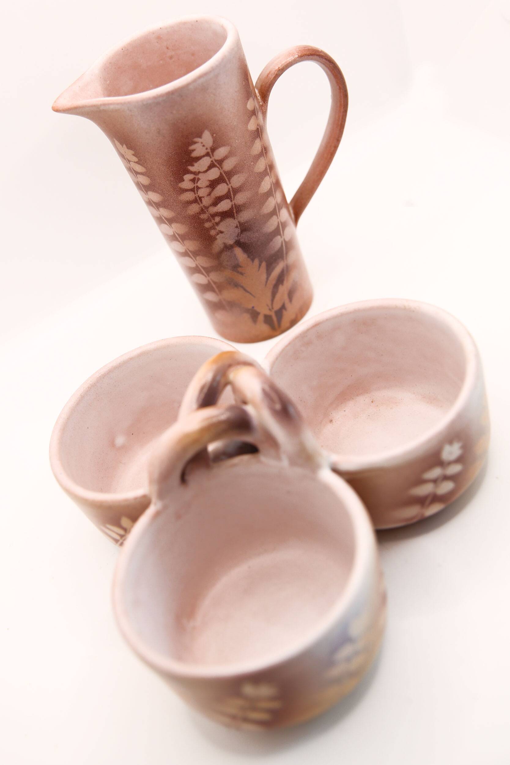 Lot of a pitcher and bowl with old pink flowers by Jean Austruy