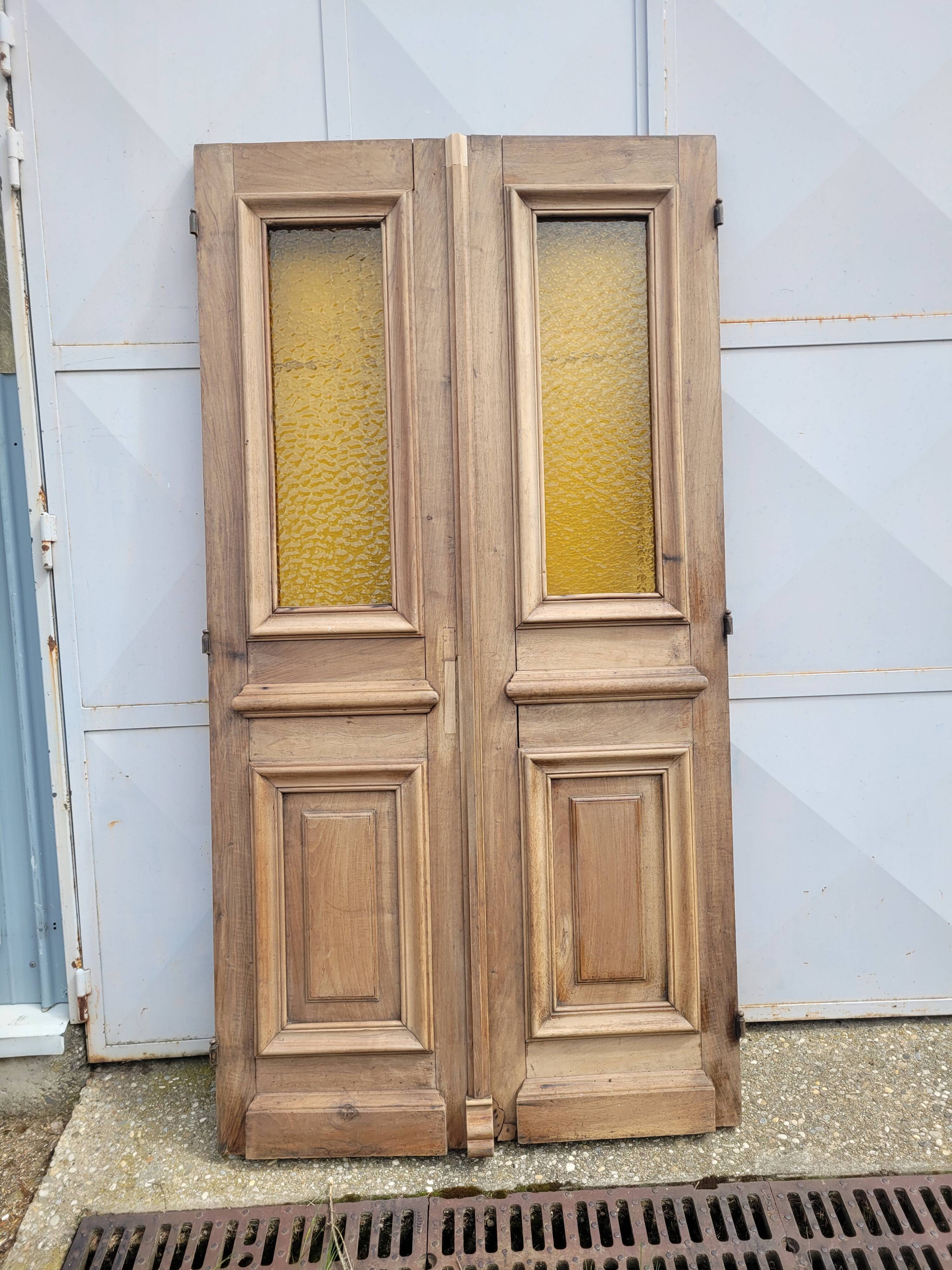Double porte d'entree haussmannienne du xixéme siecle en noyer massif