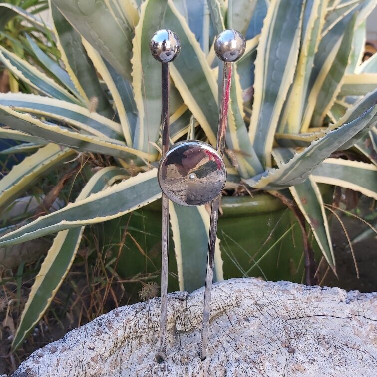 Modernist sugar pinch chrome metal