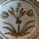Vintage hollow plates in sandstone series of four marked Longchamp