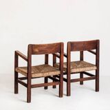 Pair of rustic armchairs in solid wood and straw seats. France, 1940s