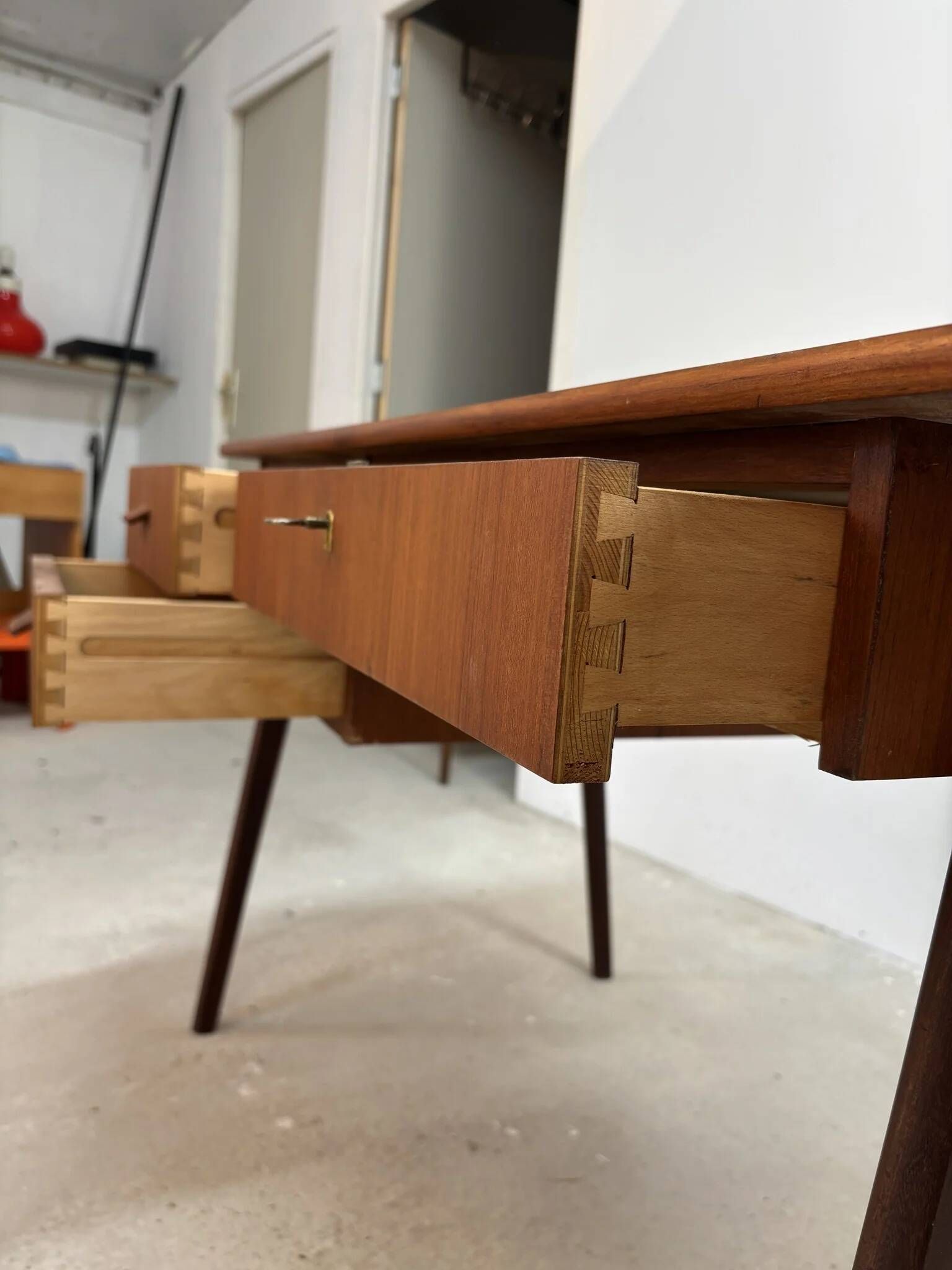 Flat desk in teak with three drawers, Scandinavian work from the 1950s-70s.