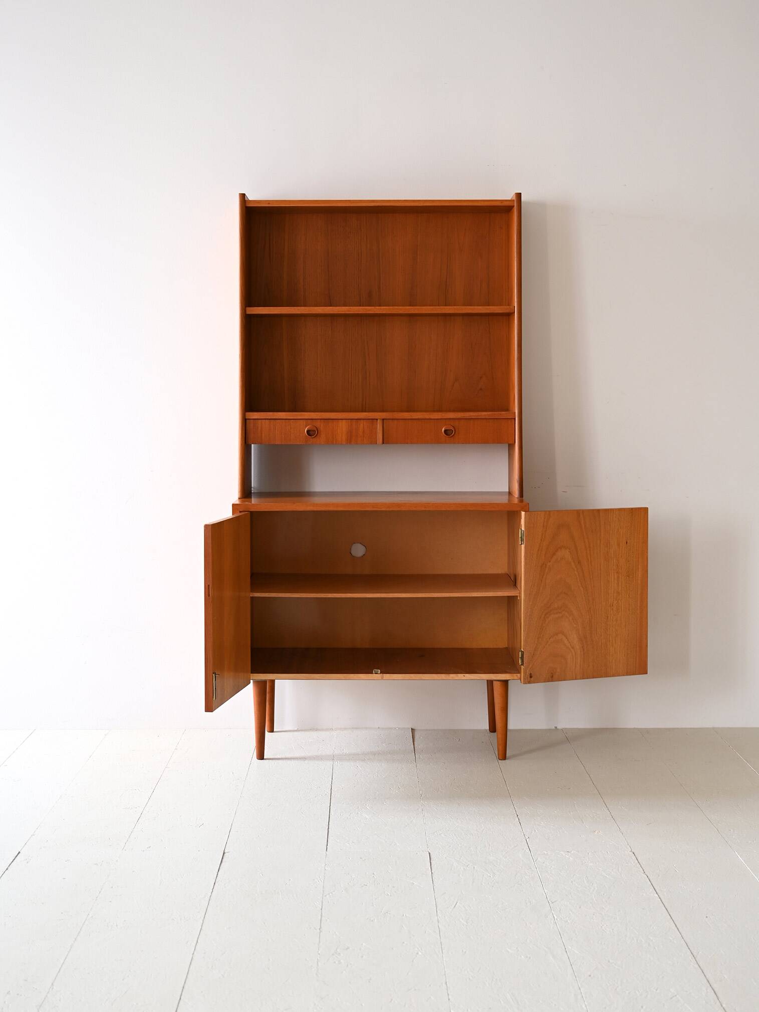 Bookcase with drawers and storage compartment