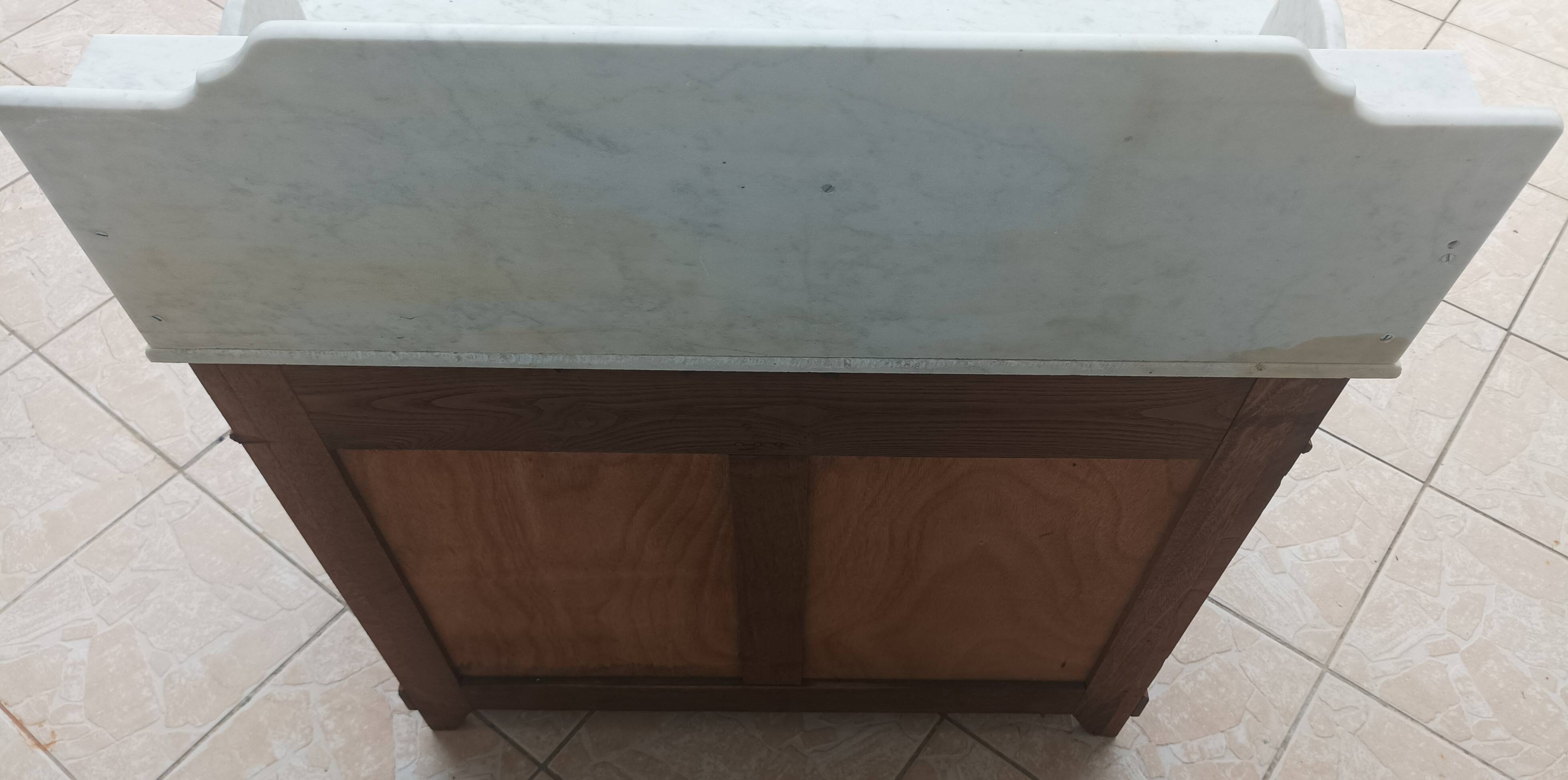 Antique walnut and white marble bathroom cabinet