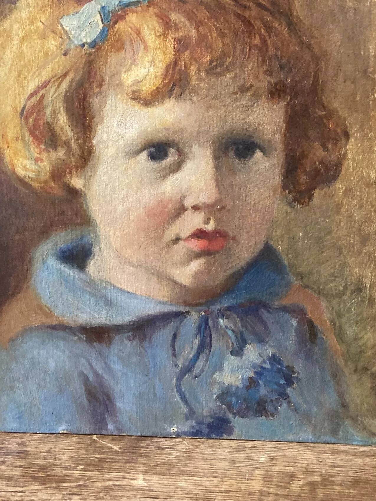 Portrait of a child signed Morin 1922 – oil on mounted panel 29 × 35 cm