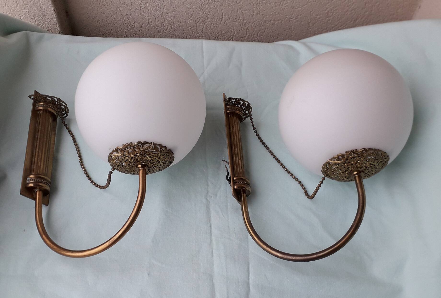 Pair of metal and opaline wall lights