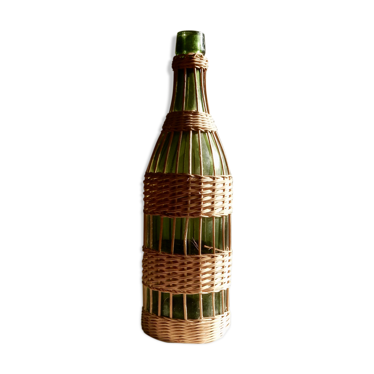 Glass bottle covered with wicker, France of the 60
