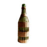 Glass bottle covered with wicker, France of the 60