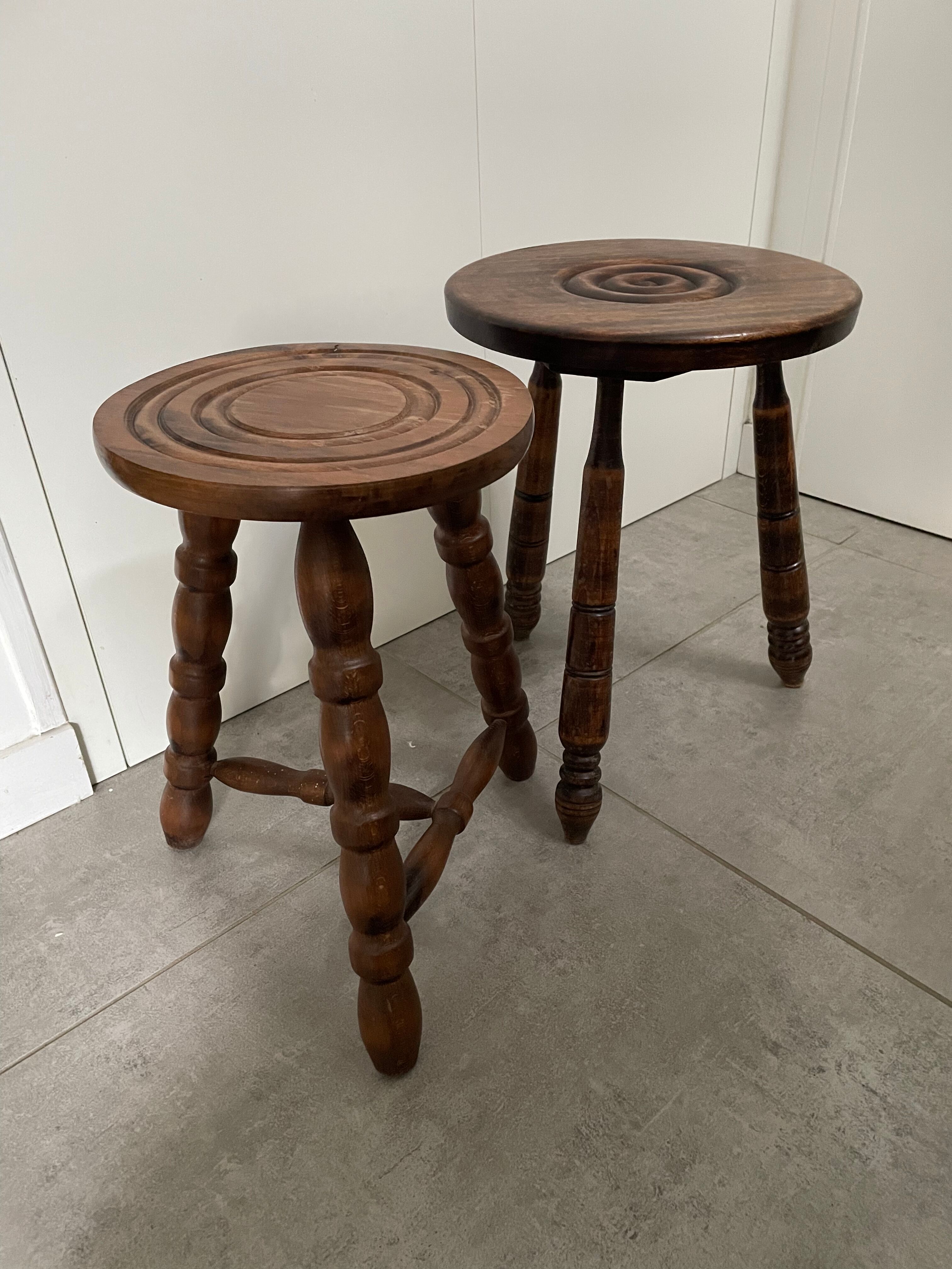 Set of two tripod stools in turned wood