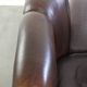 Dark sheepskin club armchair with unique design in English style
