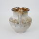 Glazed ceramic jug with plant decoration