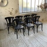 Set of 7 black bistro chairs