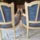 Pair of Louis XVI cabriolet armchairs in cream and blue French elegance late 19th century