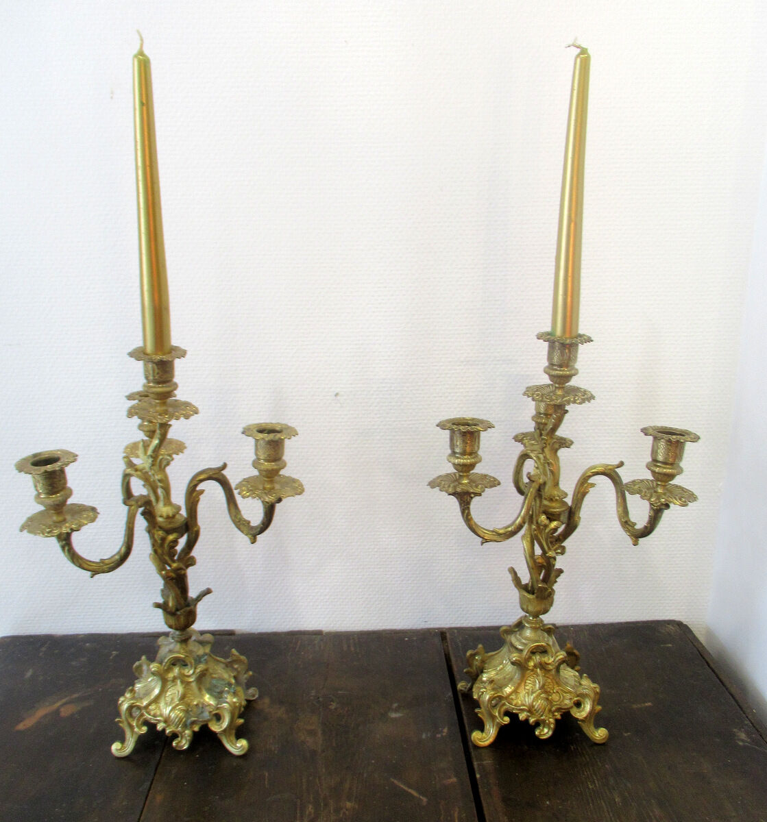 Pair of bronze candelabras and brass bobèches