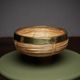 Rattan and brass fruit basket
