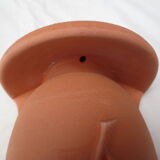 Pair of decorated terracotta wall flower pots