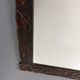 Arts & Crafts hand-carved wall mirror with floral roses, early 20th century