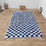 Moroccan Berber rug with a blue and ecru checkerboard pattern – 250 x 147 cm