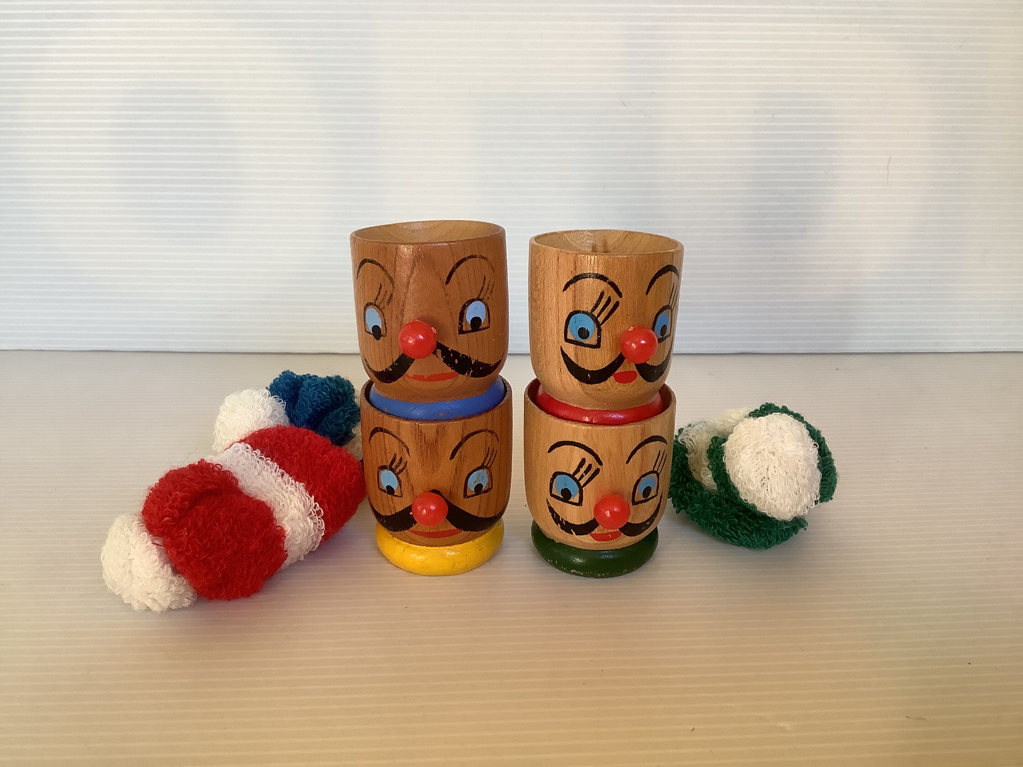 4 old wooden egg cups